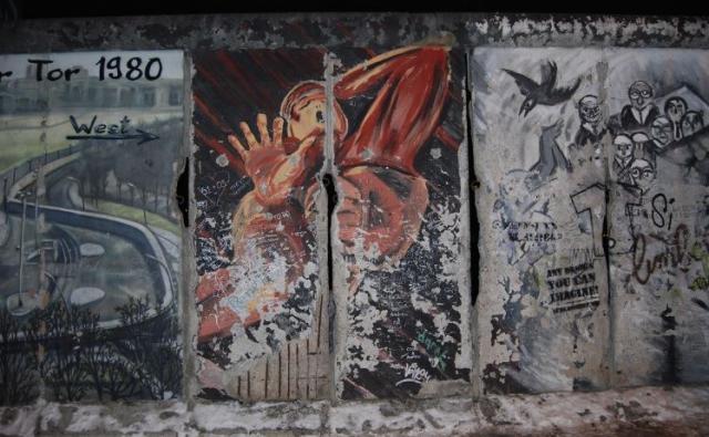 Berlin Wall art with graffiti, West Side Gallery, Berlin, Germany